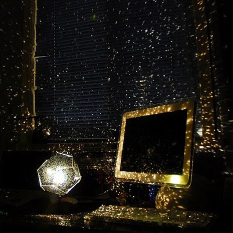 LED starry sky projector night light showing constellation projection on a bedroom ceiling.