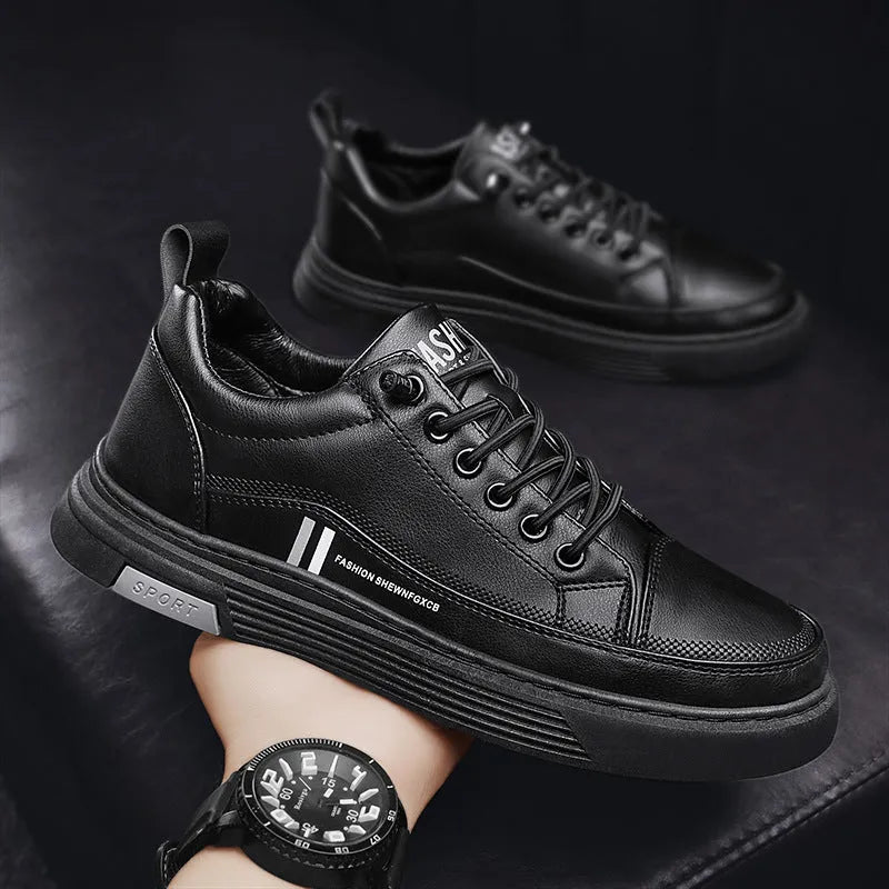 Men's white and black low-top skate shoes with elastic band and round toe.