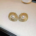 Women's vintage floral earrings with pearl accents and electroplated alloy construction