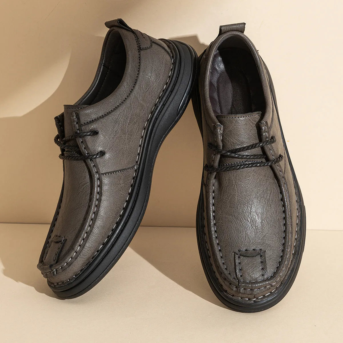 Business casual PU leather loafers for men, brown lace-up style with rubber sole and stitching detail