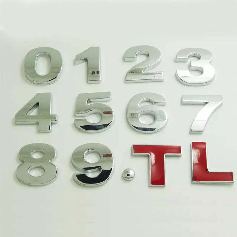 3D metal zinc alloy car letter sticker in black or silver, shown actual size at 2.5cm.
