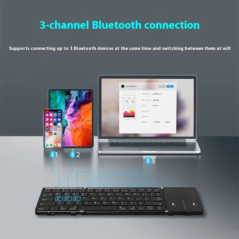 Black folding Bluetooth keyboard for mobile phones and tablets, shown next to a phone.