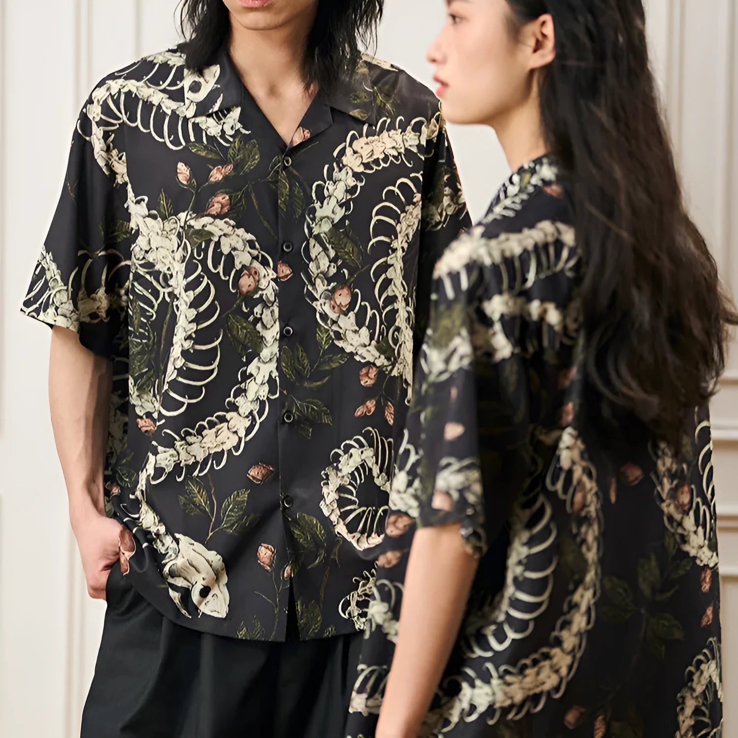 Short sleeve loose fit Cuban collar shirt with snake bone and floral printed pattern.