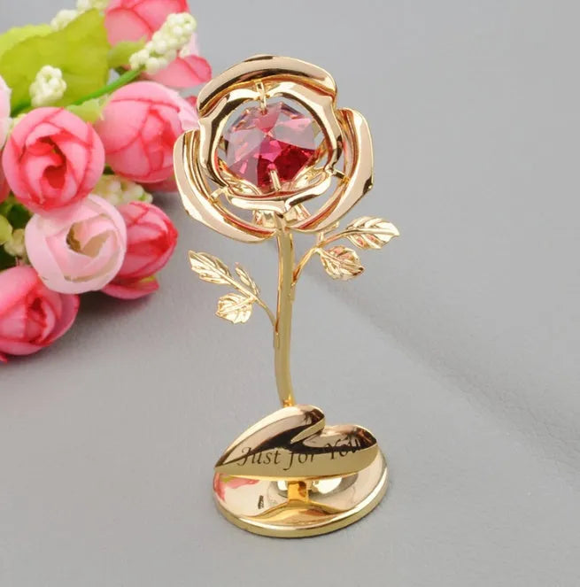 Gold artificial rose with diamond accent decoration on display