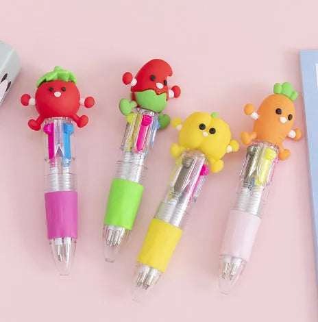 Cartoon character four colour press ballpoint pen with 0.7mm tip on a notepad.