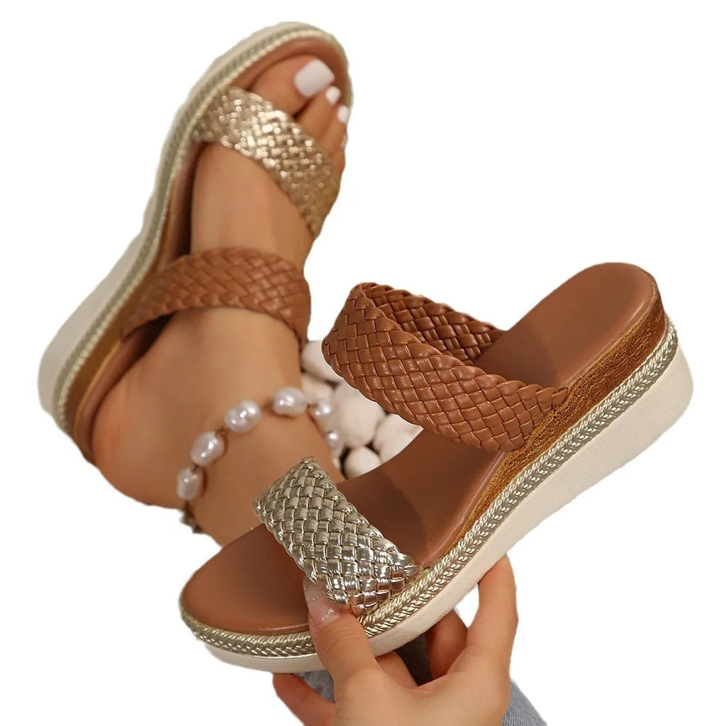 Gold wedge sandals for women with an adjustable ankle strap and a rubber sole.