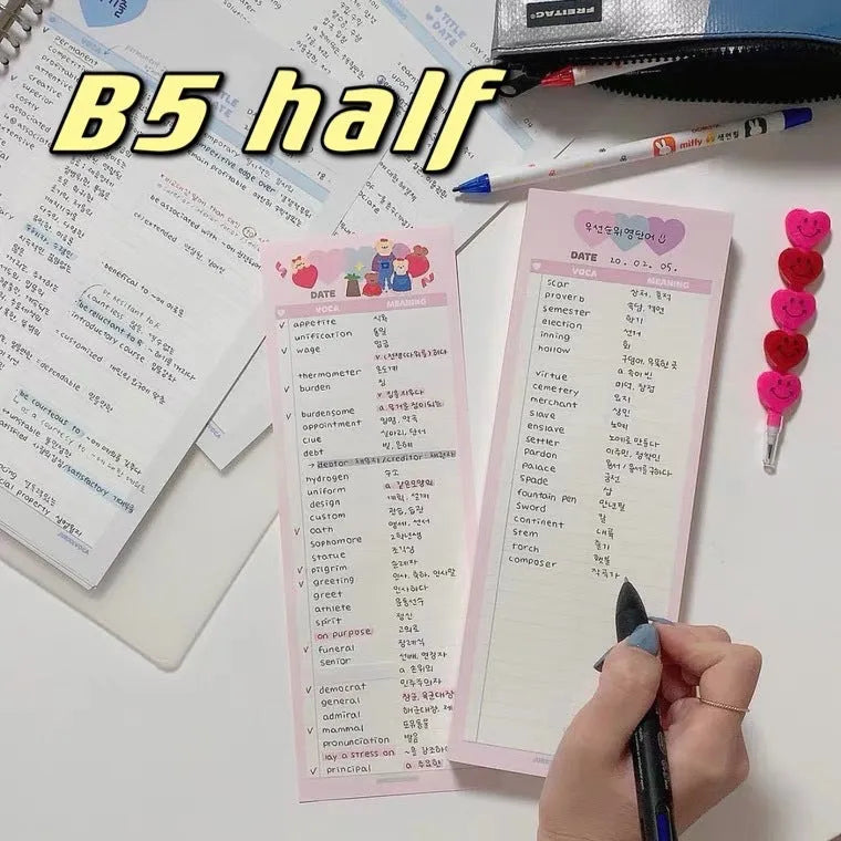 Half-B5 size notepad with English words, shown in pink, purple, and blue cover colour options.