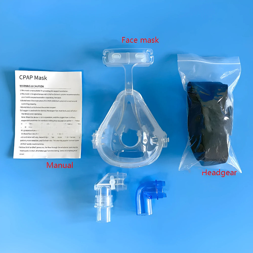 Transparent silicone CPAP breathing mask with headband and PC elbow adapters on a white background.