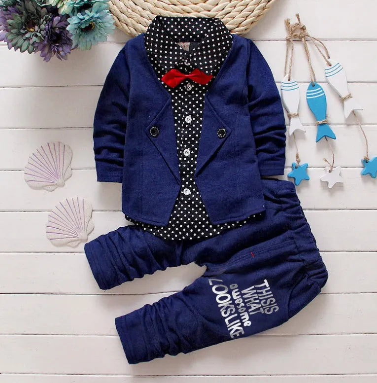 Casual blue kids sport suit consisting of a short-sleeved top and long trousers on a child mannequin.