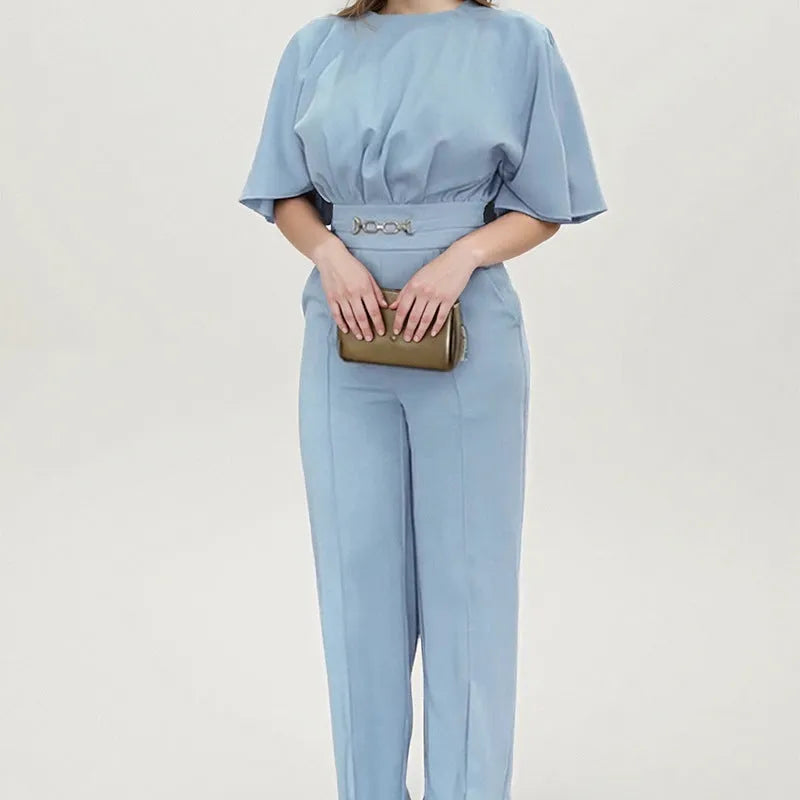 Men's blue two-piece polyester suit with long-sleeve jacket and trousers on hanger