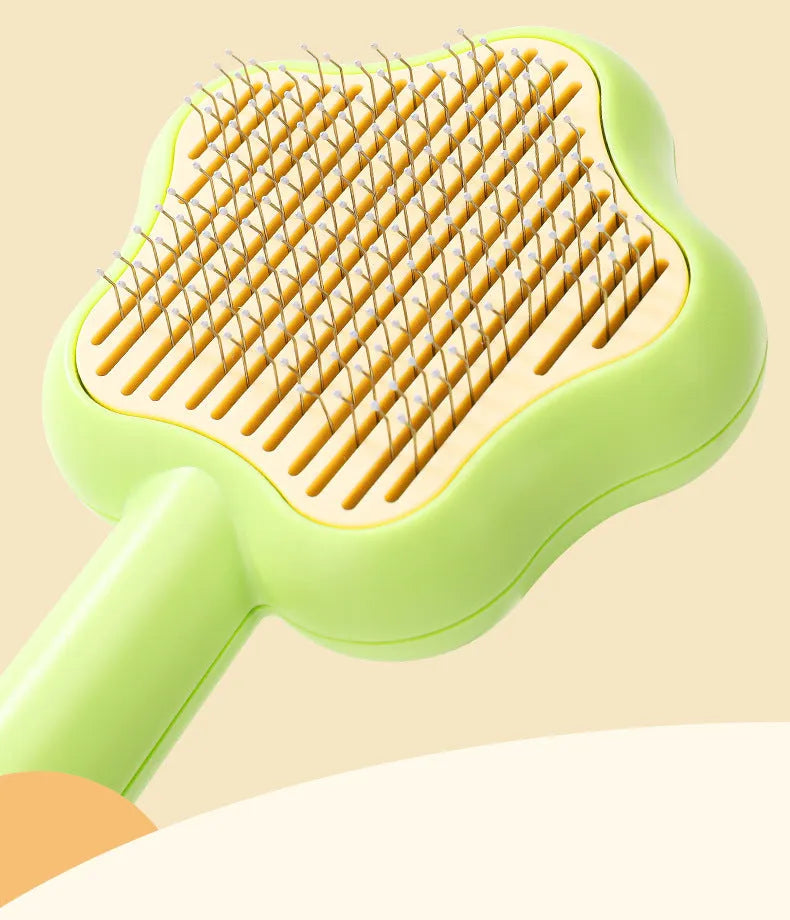 Magic Wand self-cleaning pet comb with stainless steel teeth in green colour