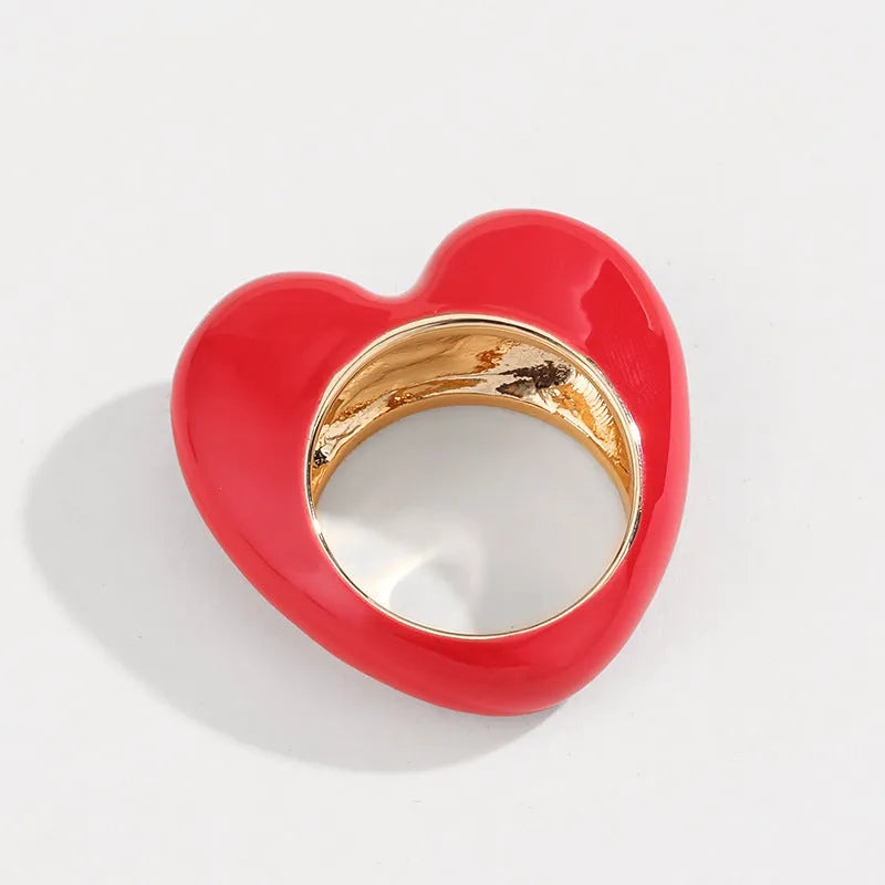 Original design heart-shaped enamel ring in black, pink, purple, or red colours.