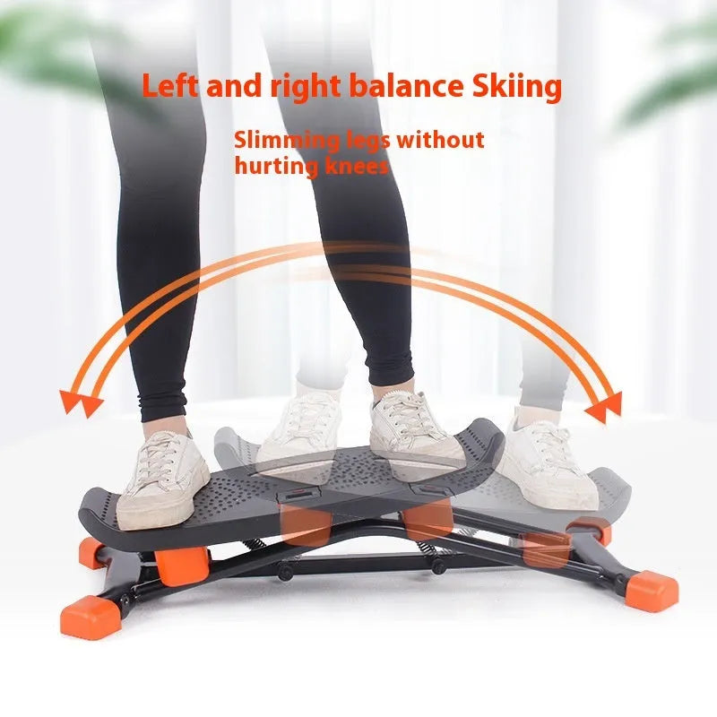 Black mini fitness skiing machine with elastic hand straps for home indoor exercise