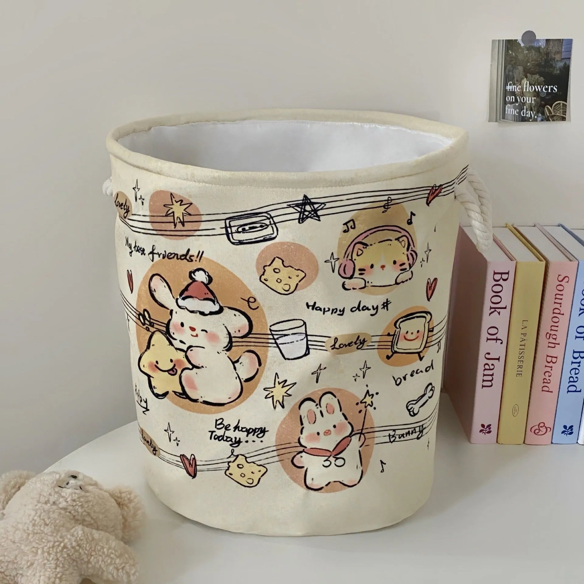 Foldable cotton laundry basket in Baby Bear and Rabbit design collapsed and unfolded showing storage capacity
