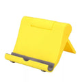 Black PE folding mobile phone stand holding a tablet at an angle on a desk