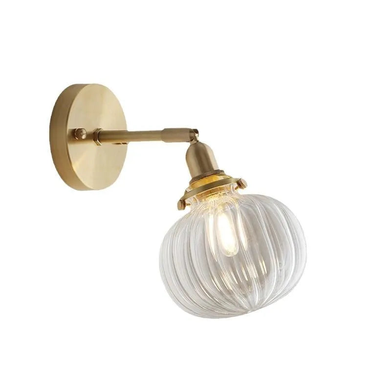 Pumpkin-shaped glass wall lamp in blue and transparent colour options.