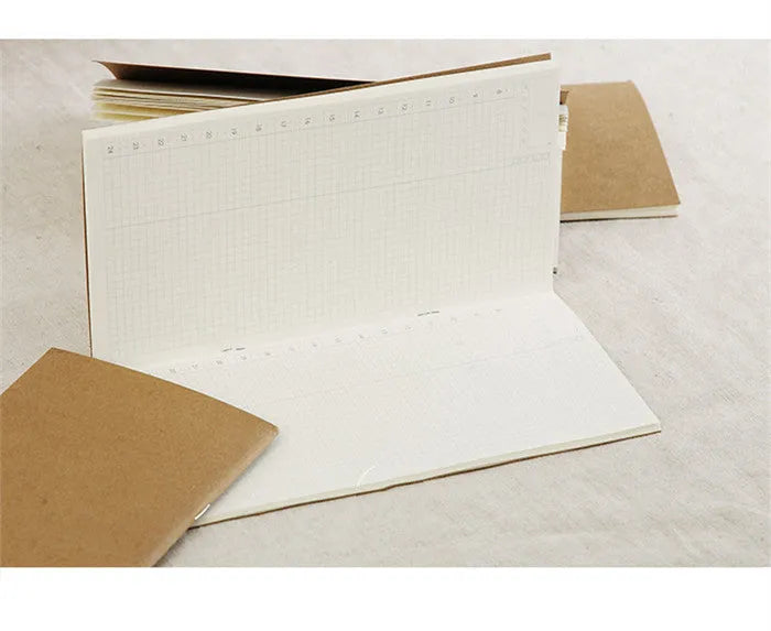 Standard size travel diary refill inner core with dots and blank ruled page options.