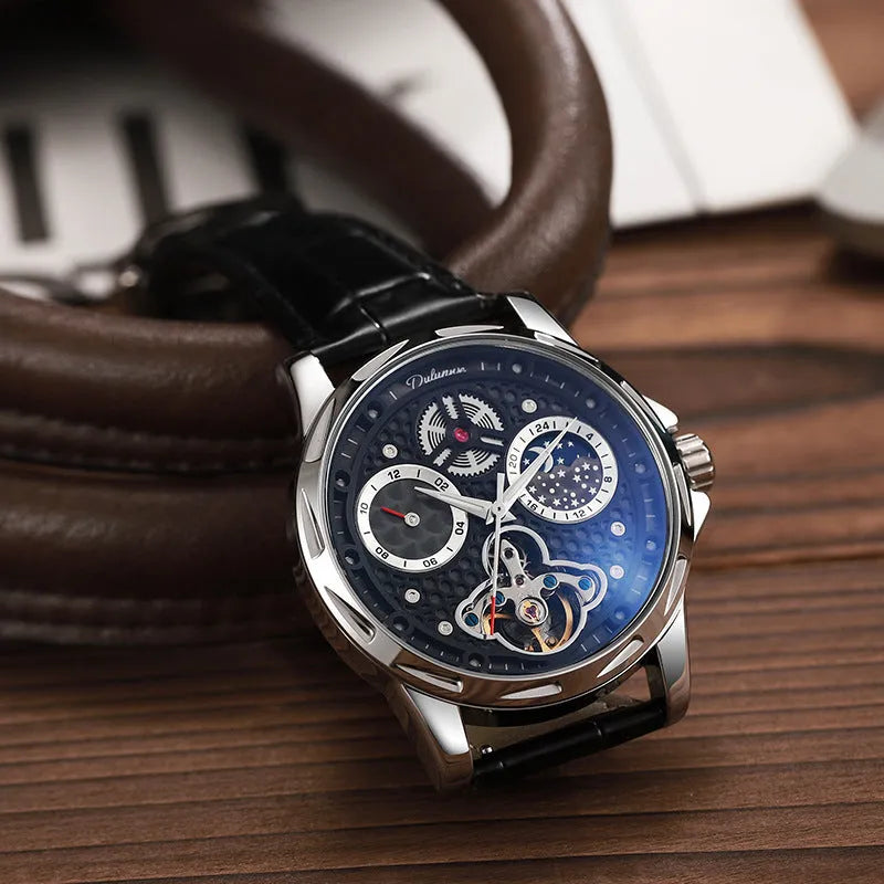 Men's automatic watch with luminous hands on a steel bracelet, showing a black dial and case.