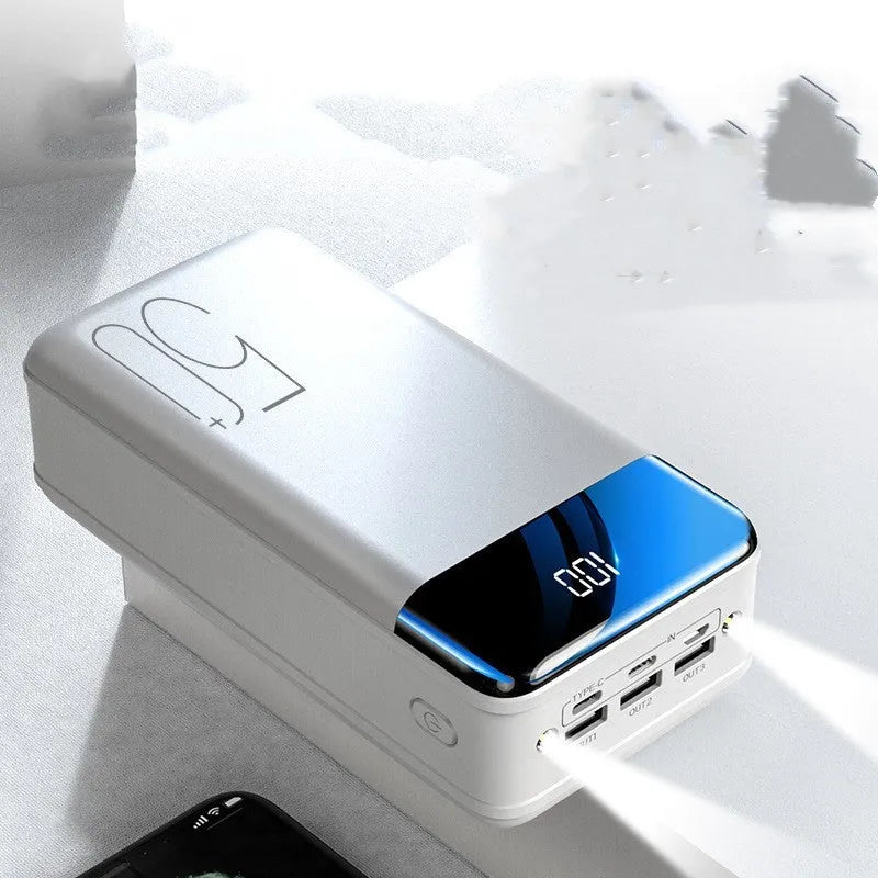 Large black or white 50000mAh power bank showing multiple USB ports on front.