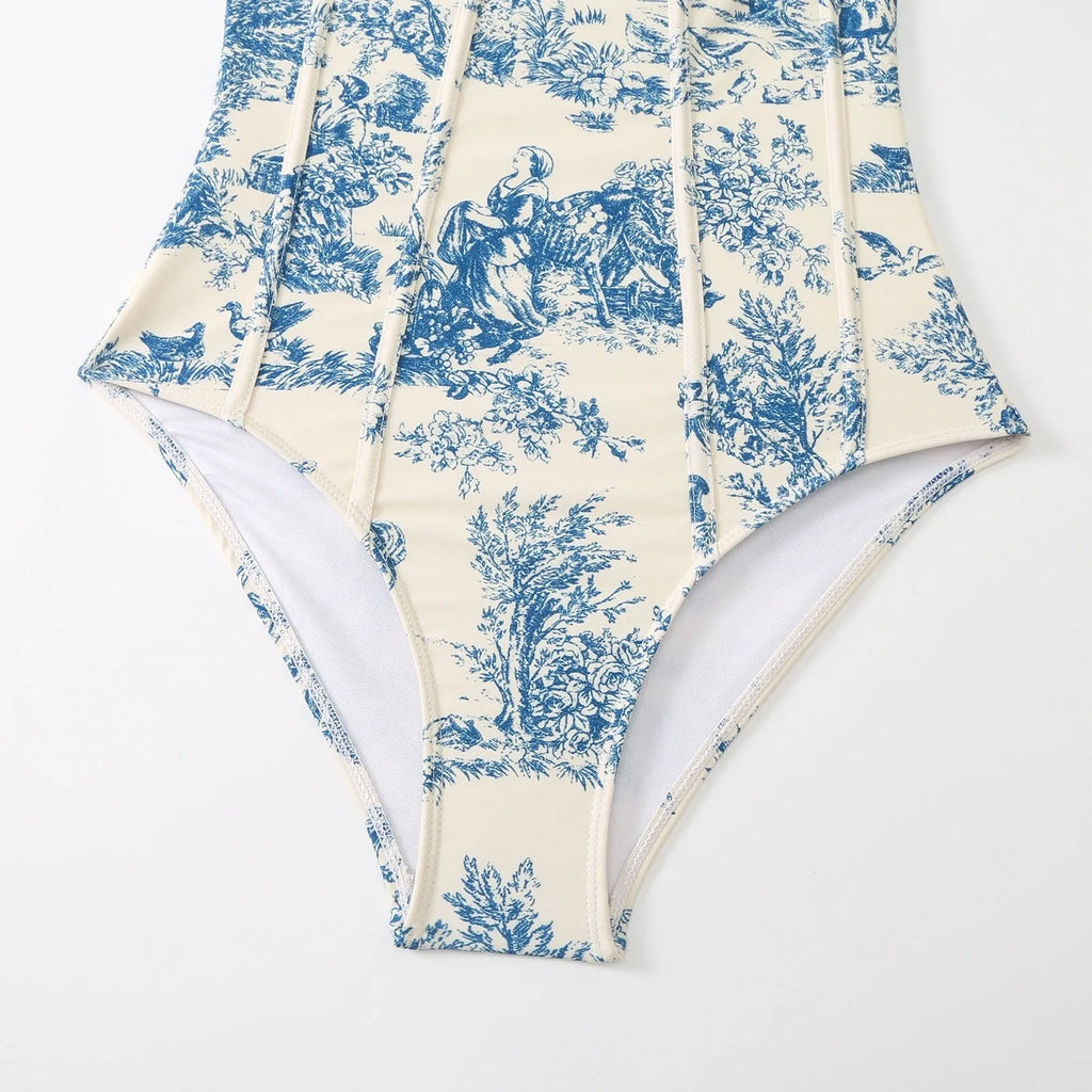 Blue women's one-piece polyester swimsuit with a separate matching gauze skirt.