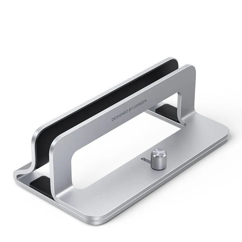 Silver aluminium alloy adjustable computer bracket clamped to a desk edge.