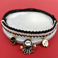 Halloween pet collar with zinc alloy charm showing pumpkin bat design on adjustable black webbing