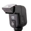 SLR camera flash accessory with tilting head shown on black background