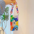 TPU mobile phone case with graffiti design and integrated bracelet for iPhone