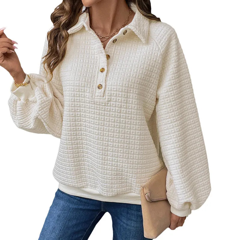 Women's milky white polo collar thickened pullover sweater on a hanger.