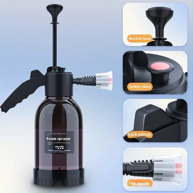 Black hand-held foam sprayer with a 2-litre capacity bottle and pump mechanism.