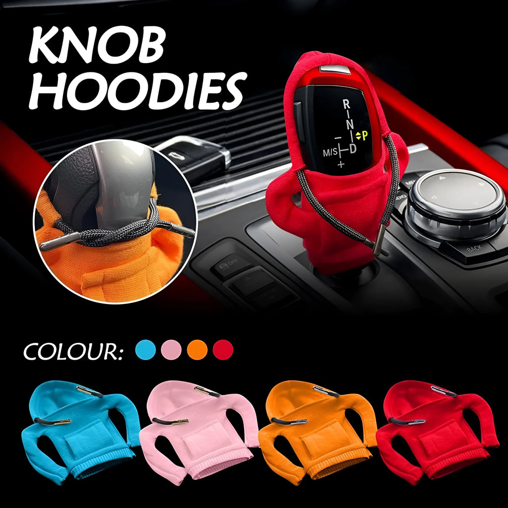 Blue cloth car gear shift knob hoodie cover shown on a gear lever.