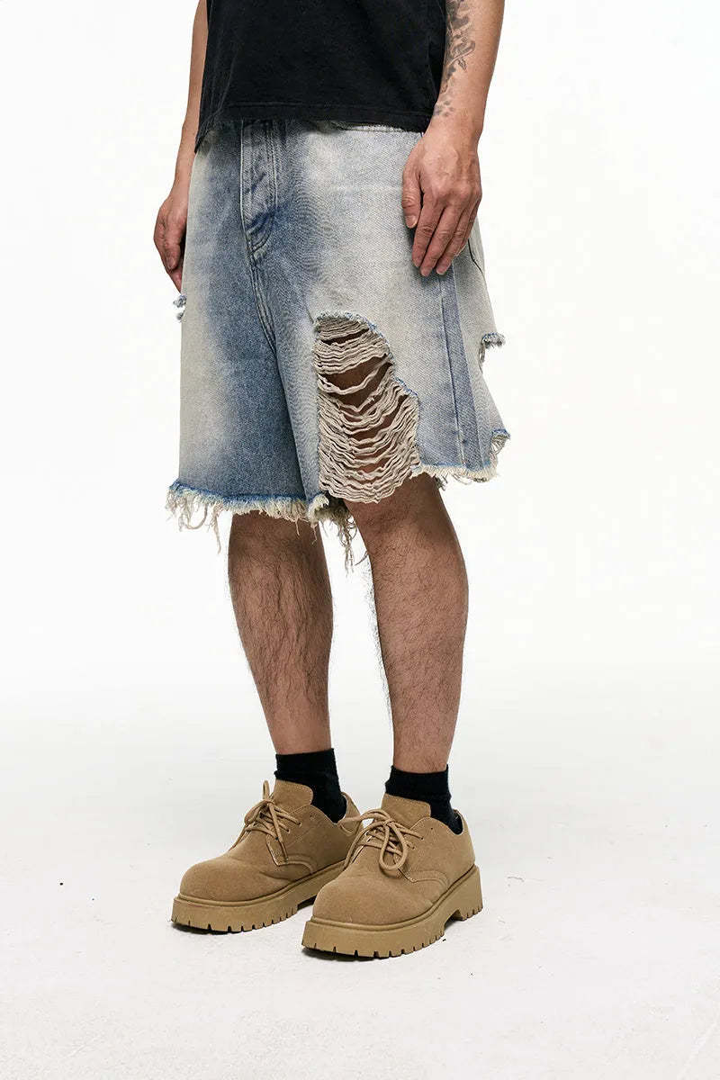 Light blue men's baggy denim shorts with wide leg cut and retro washed finish