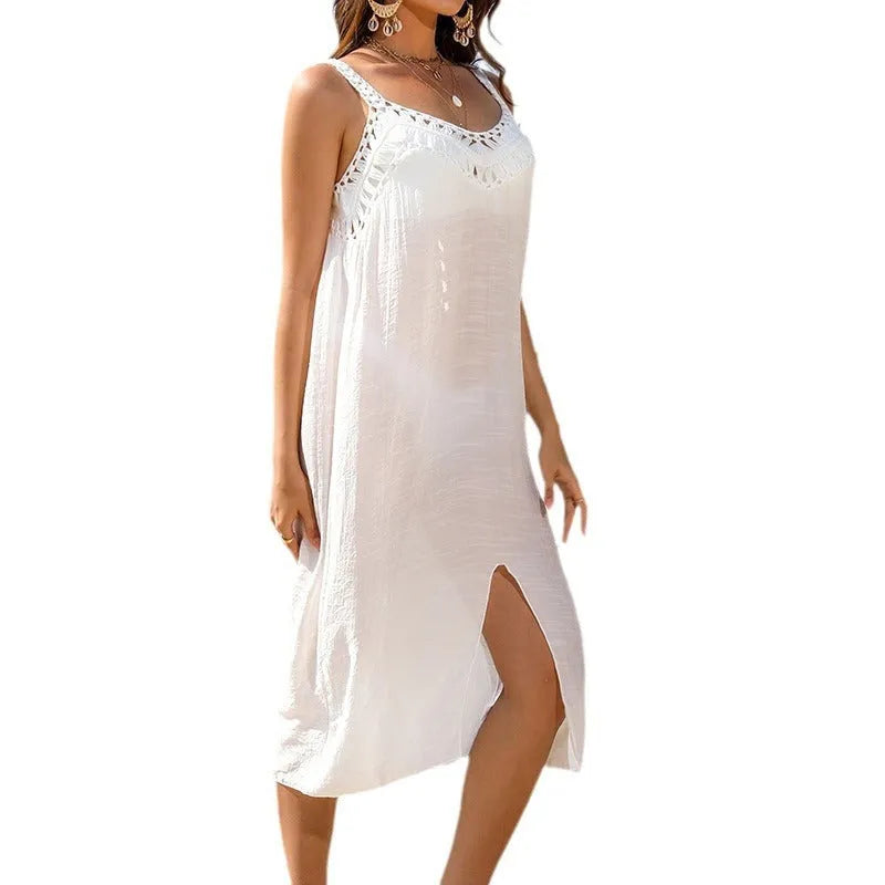 White women's suspender beach dress with woven crochet detail and side slit