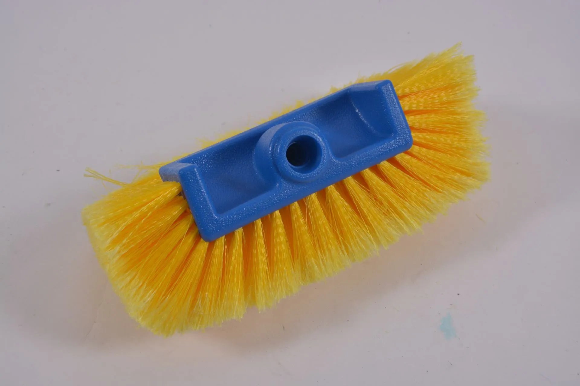 Car wash brush with four-section removable rod and flow-through head in yellow colour
