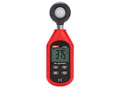 Mini lux meter UT383 with backlit display showing light reading in handheld use