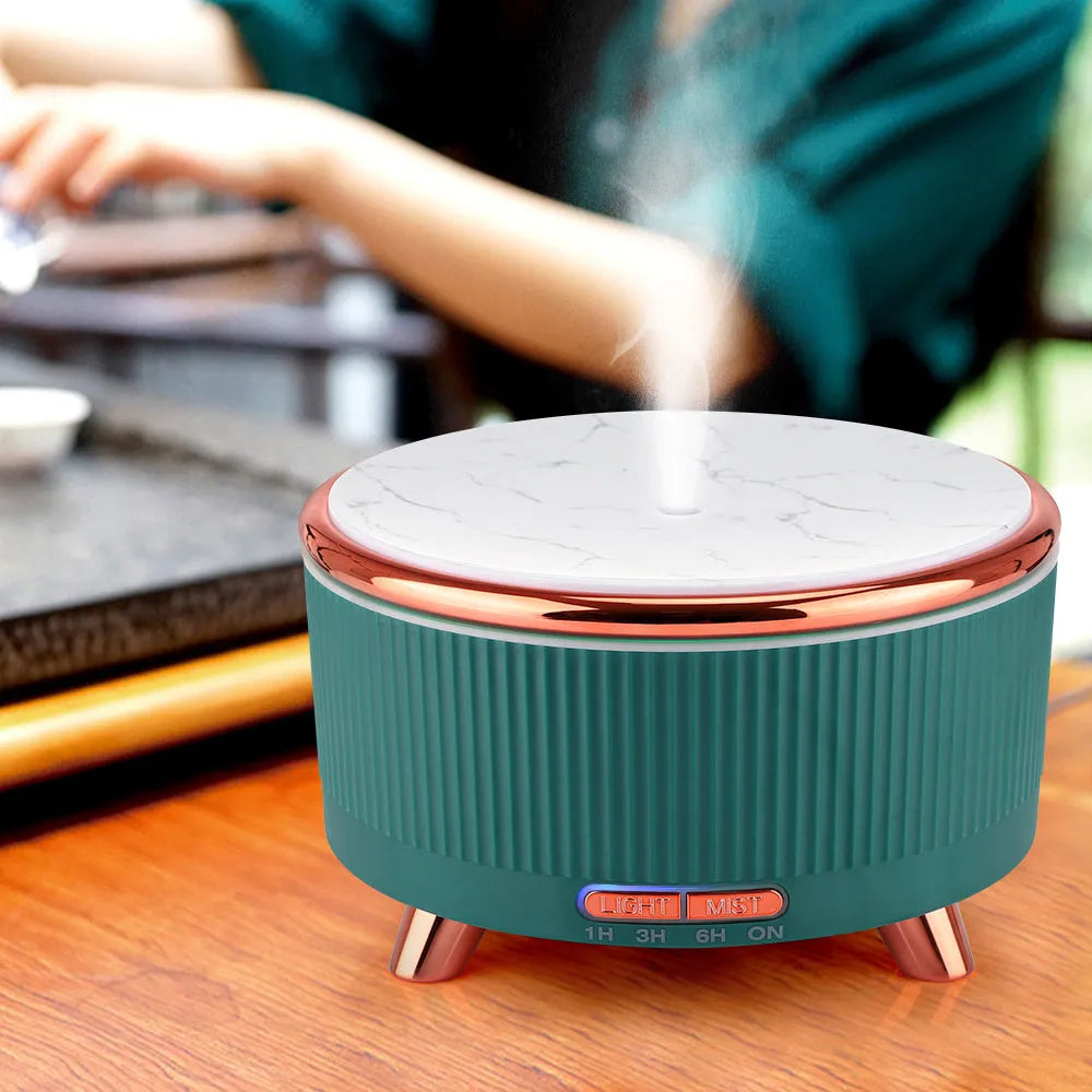 Ultrasonic aroma diffuser with 500ml tank, wood-grain finish, round shape, in green colour