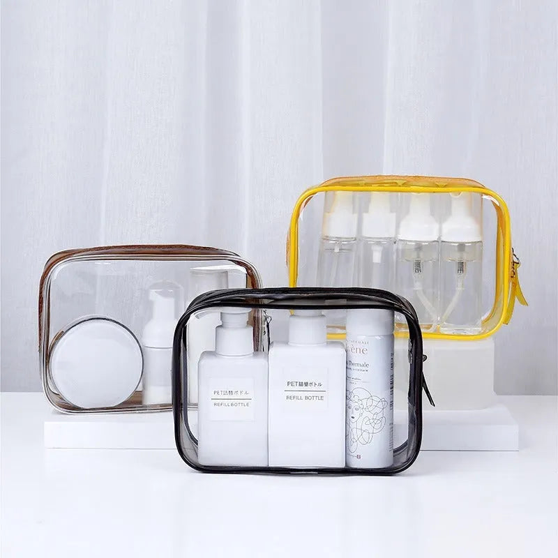 Set of three semi-transparent PVC makeup bags in pink with Labubu stickers, showing large and extra-large sizes.