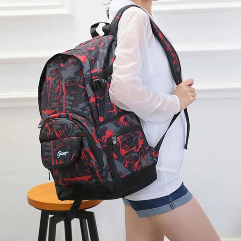 Blue large capacity nylon backpack with padded straps on a plain background