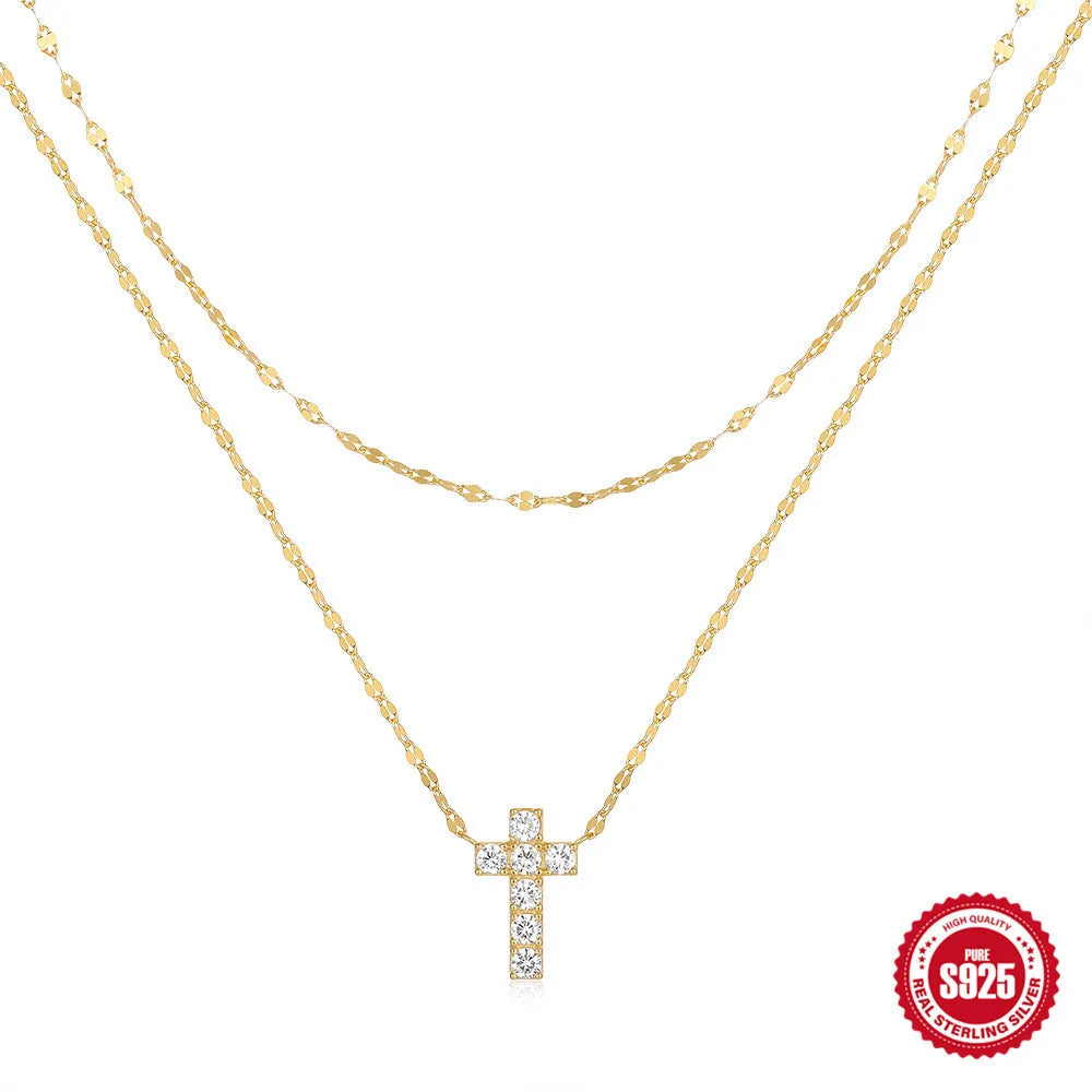 S925 sterling silver double layer twin diamond cross pendant necklace on a clavicle chain in gold colour.