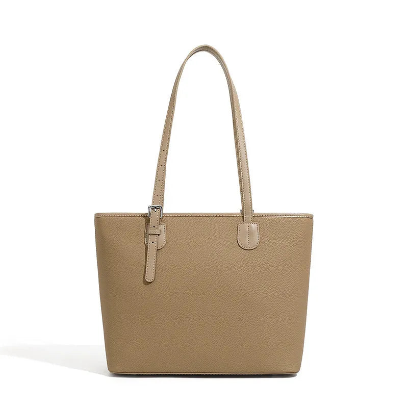 Genuine leather women's retro tote bag in dark grey showing internal zipper and phone pockets