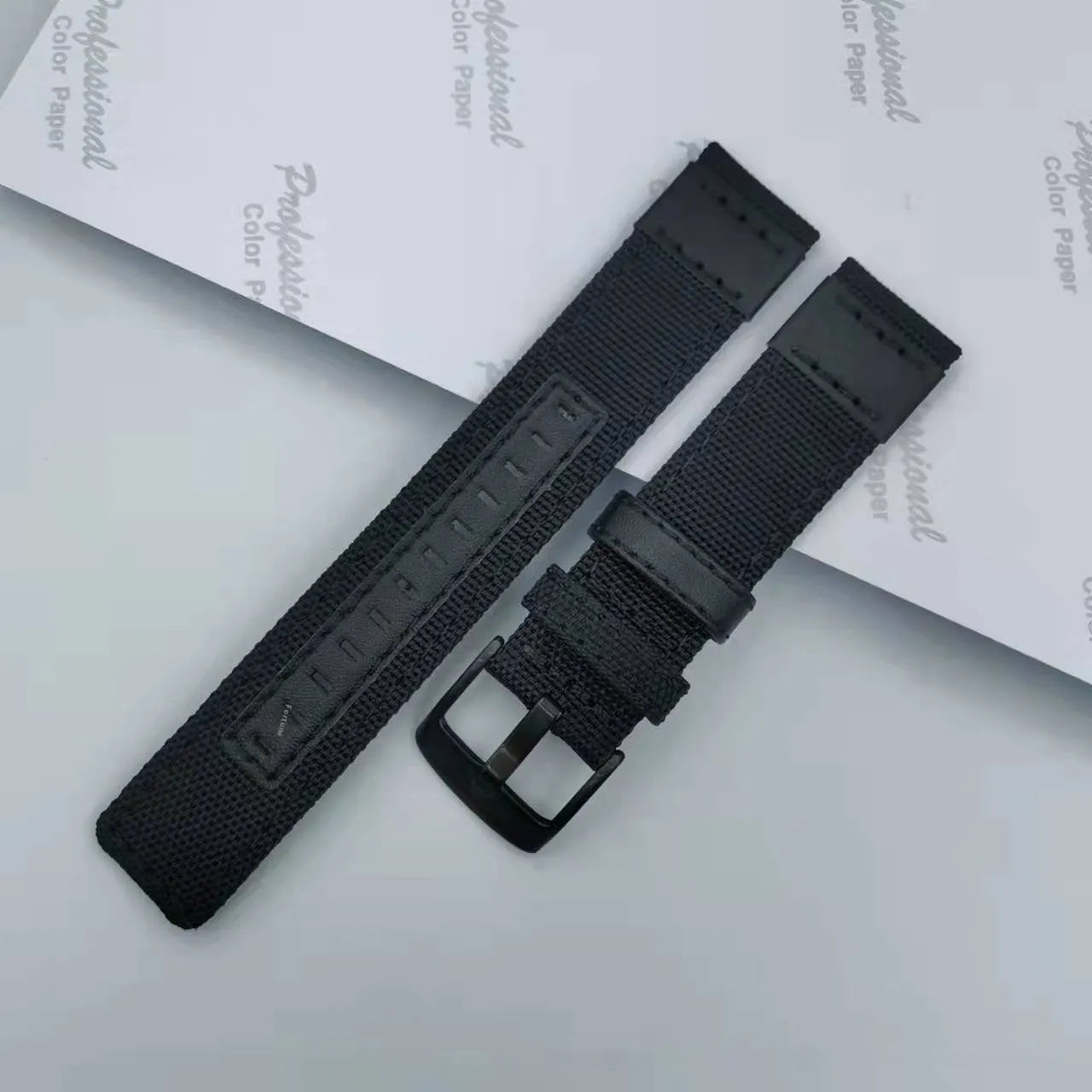 Oxford cloth canvas watch strap with quick-release bars shown in camouflage colour.