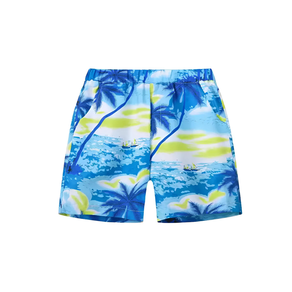 Colourful printed beach shorts on a hanger showing coconut tree and dinosaur designs.