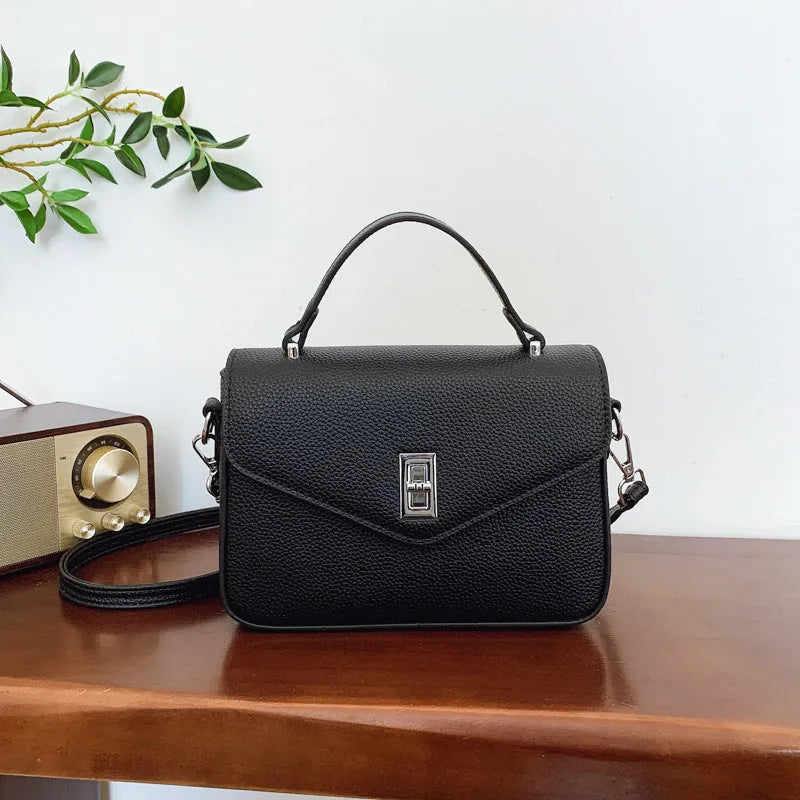 Fashion casual all-match commute cowhide portable shoulder messenger bag in PU leather with sewing thread detail