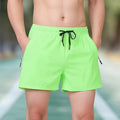 Black micro-elastic polyester training shorts with high waist and drawstring closure