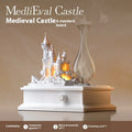 White medieval castle ornament aromatherapy machine with ambient light on a table.