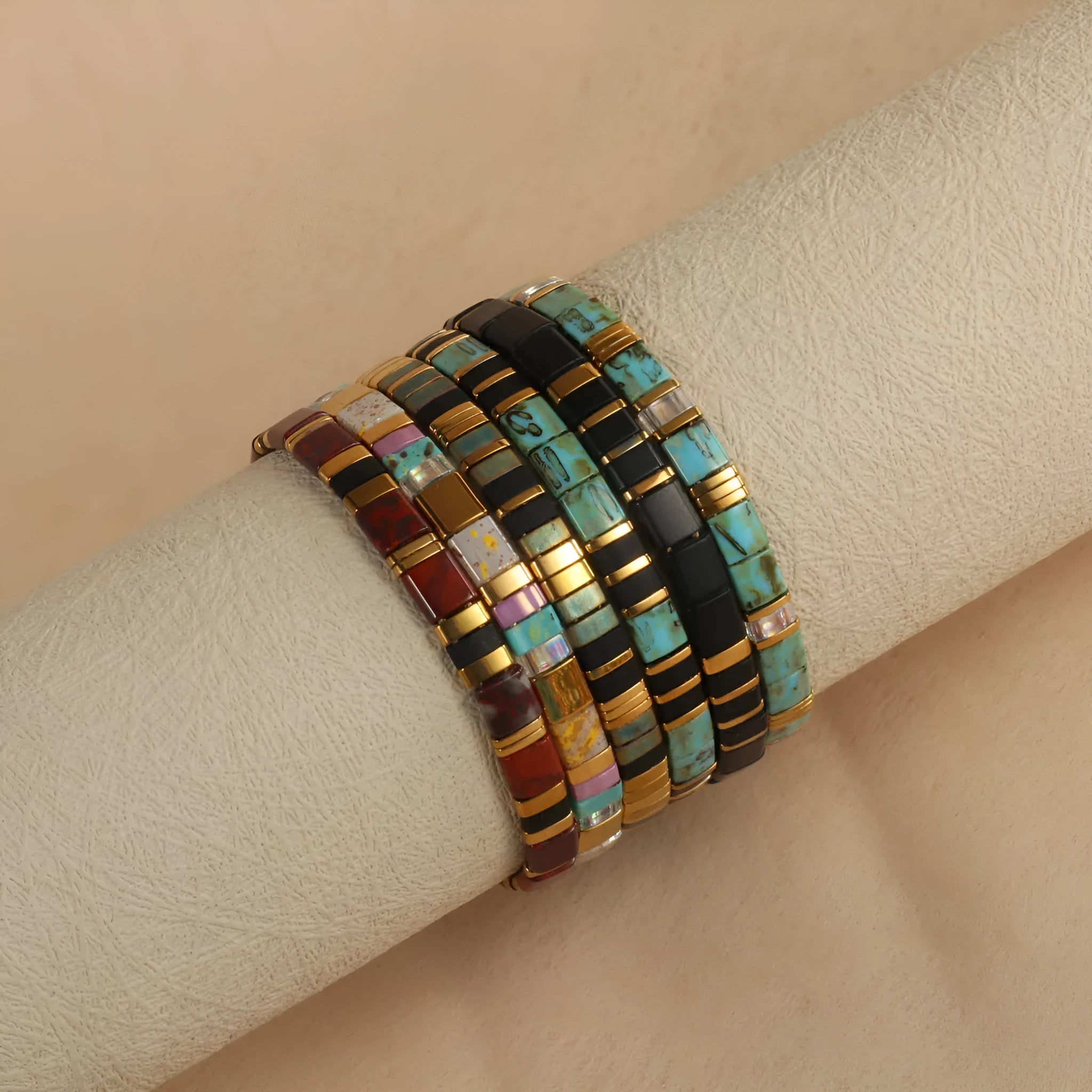 Geometric glass bead bracelet in milky white, black, retro green, light blue, or red colours.