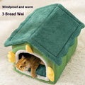 Large grey closed cat nest pet bed with a thick removable cushion inside, shown next to a tabby cat.