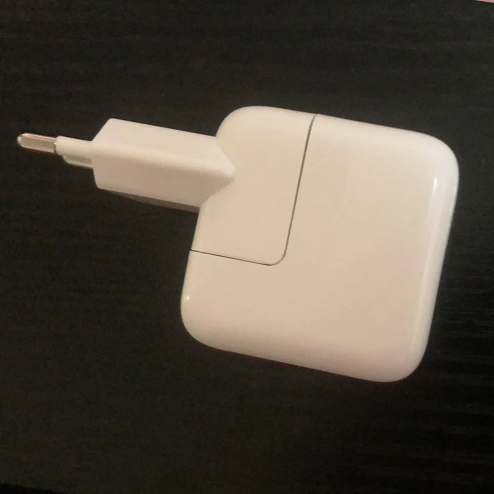USB iPad tablet charger with international plug options in white