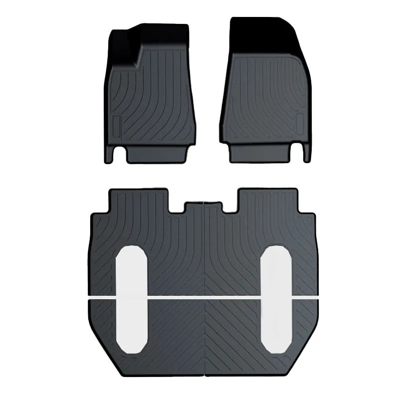 Heavy-duty rubber floor mats for Tesla cars with TPE footrest section.