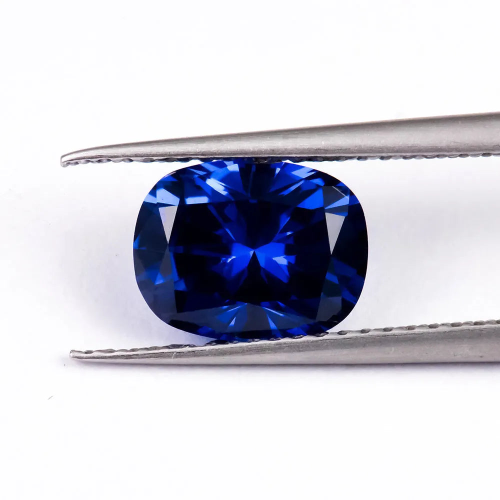 Royal blue gemstone in heart shape with modern cut on neutral background